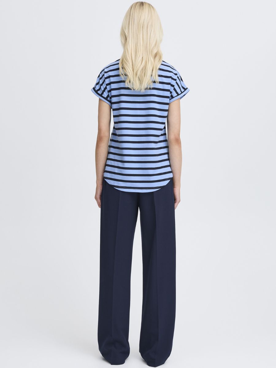 Back view of B. Young Pamila Striped Crew Tee in blue and black stripes with navy wide-leg trousers by B. Young.