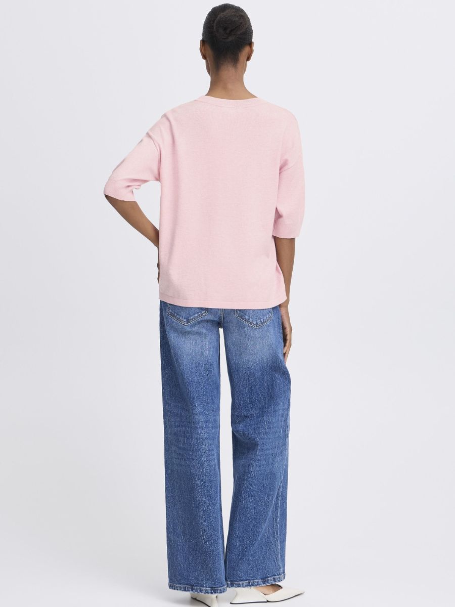 B. Young Morla Short Sleeve Crew Top in light pink by B. Young, styled with casual blue denim jeans.