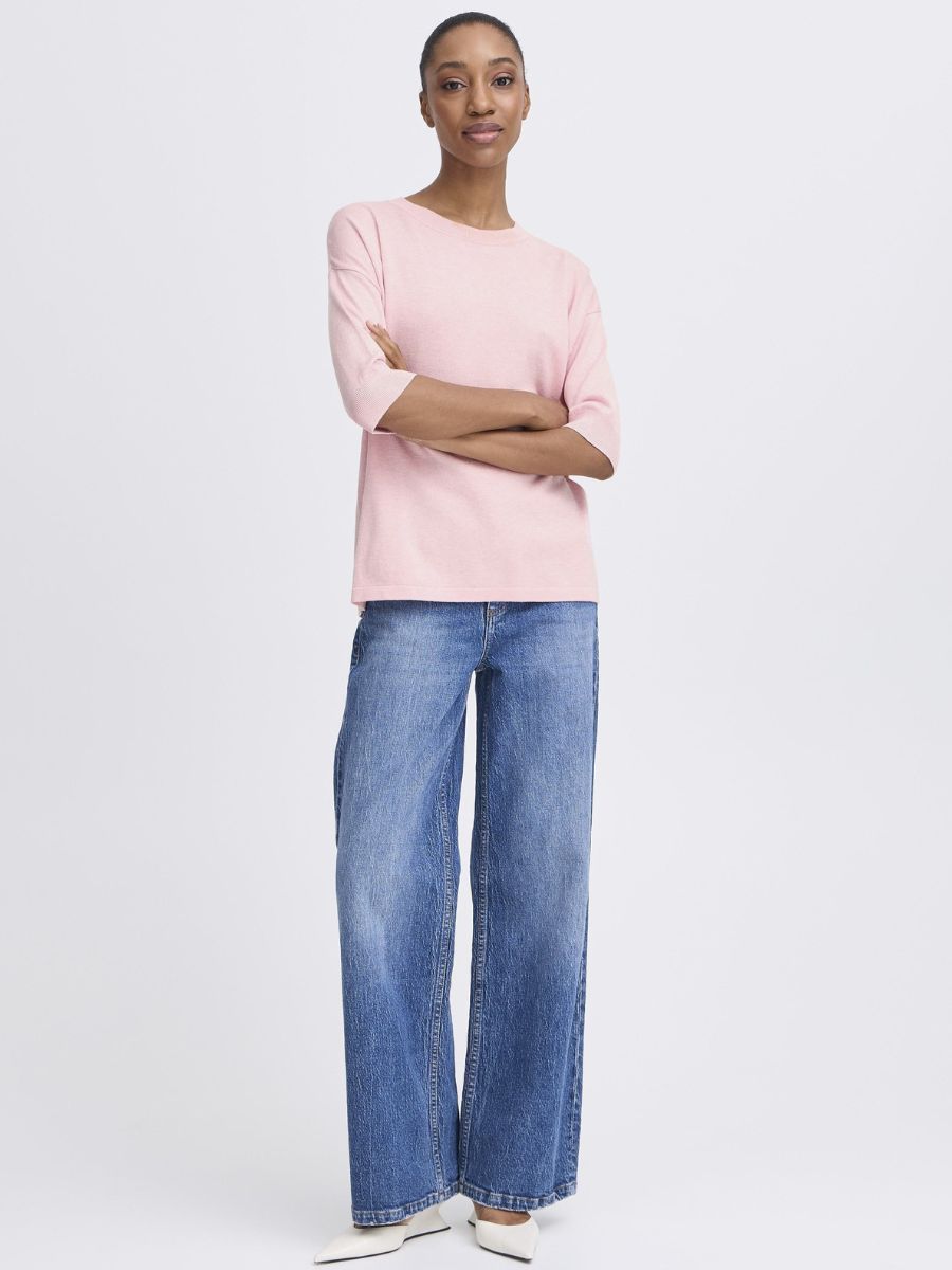 Light pink B. Young Morla Short Sleeve Crew Top paired with blue wide-leg denim jeans and white shoes.