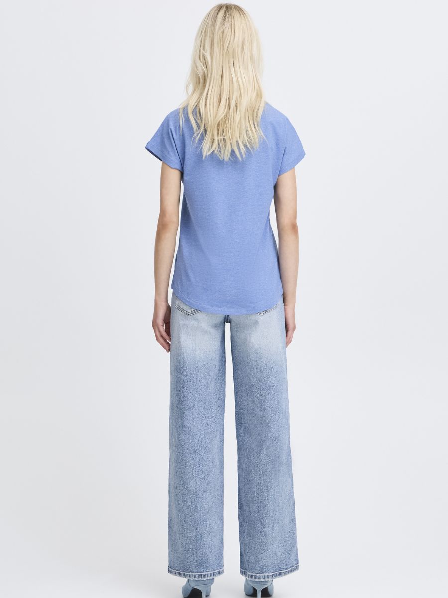 Back view of B. Young Pamila V-Neck Short Sleeve Tee in blue paired with light wash denim jeans by B. Young.