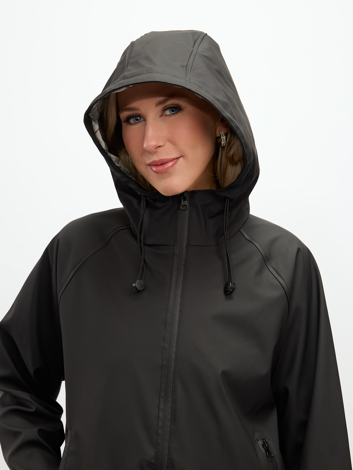 Close-up of a black B. Young Avan Long Rain Coat with hood and zip closure, showcasing outerwear style by B. Young.