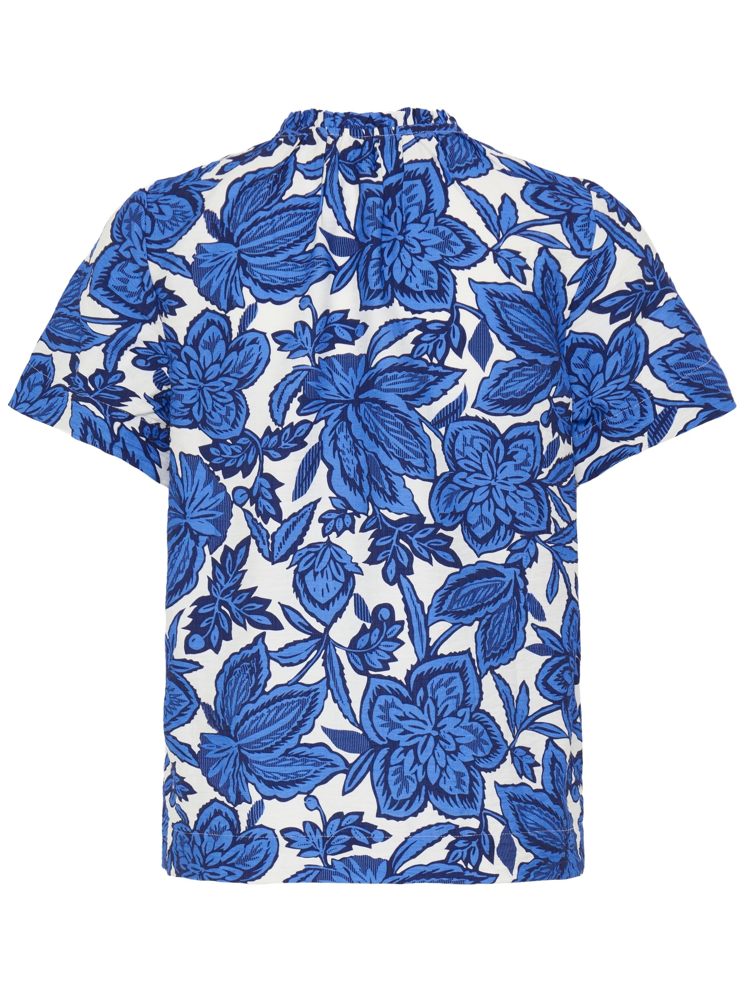 B. Young Ikaia Ruffle Short Sleeve Top in blue floral pattern, short sleeves, and ruffle neckline by B. Young.