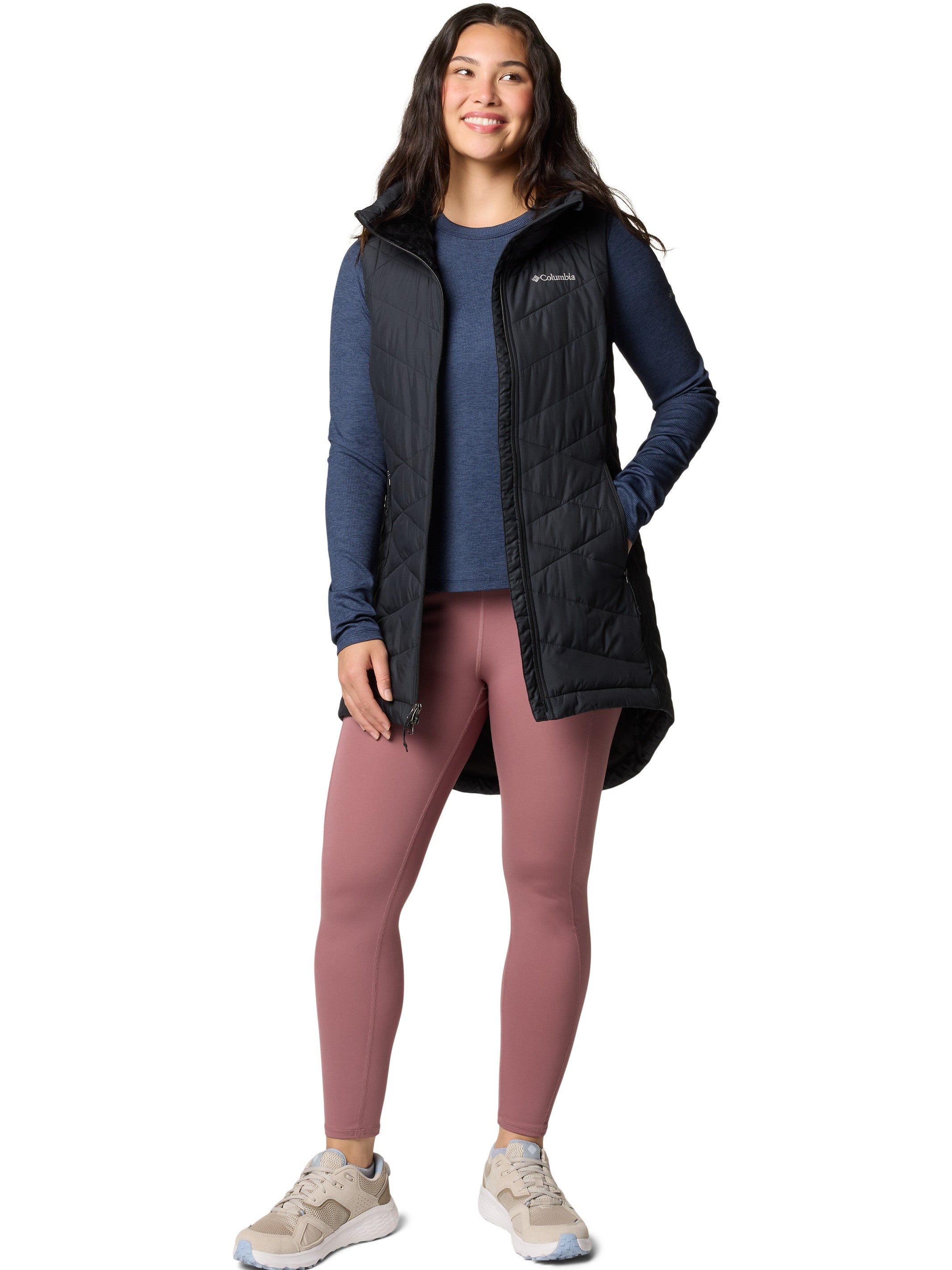Columbia Heavenly II Omni-Heat Long Vest in black styled with casual activewear for versatile outerwear layering.