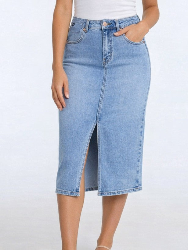 Light blue denim skirt with front slit and pockets, styled simply in the Lois Leila Front Slit 29" Denim Skirt by Lois.