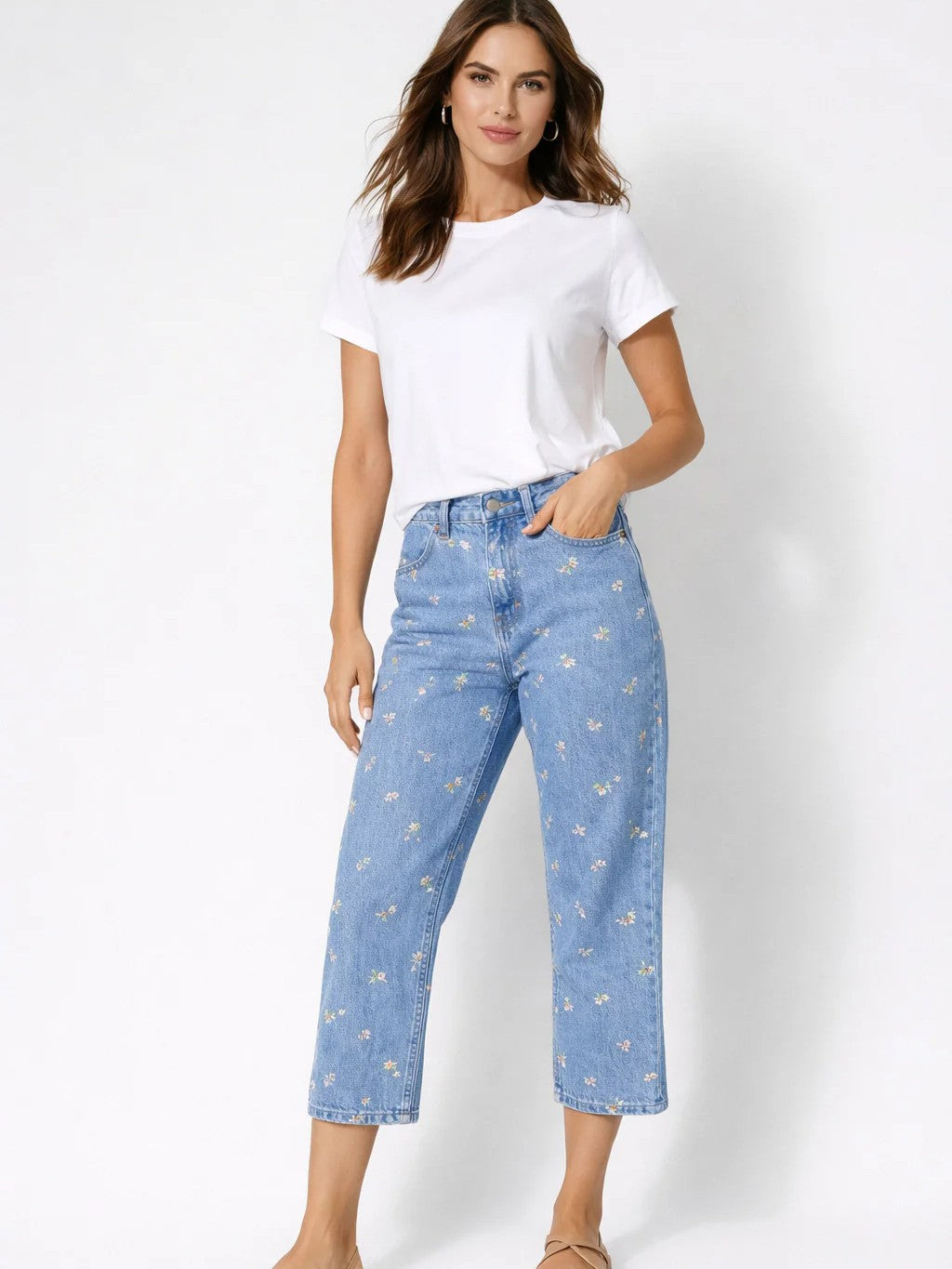 Lois Denim Gigi Daisy Embroidered 25 Inch Crop Jeans in light blue denim with floral embroidery and a white top.
