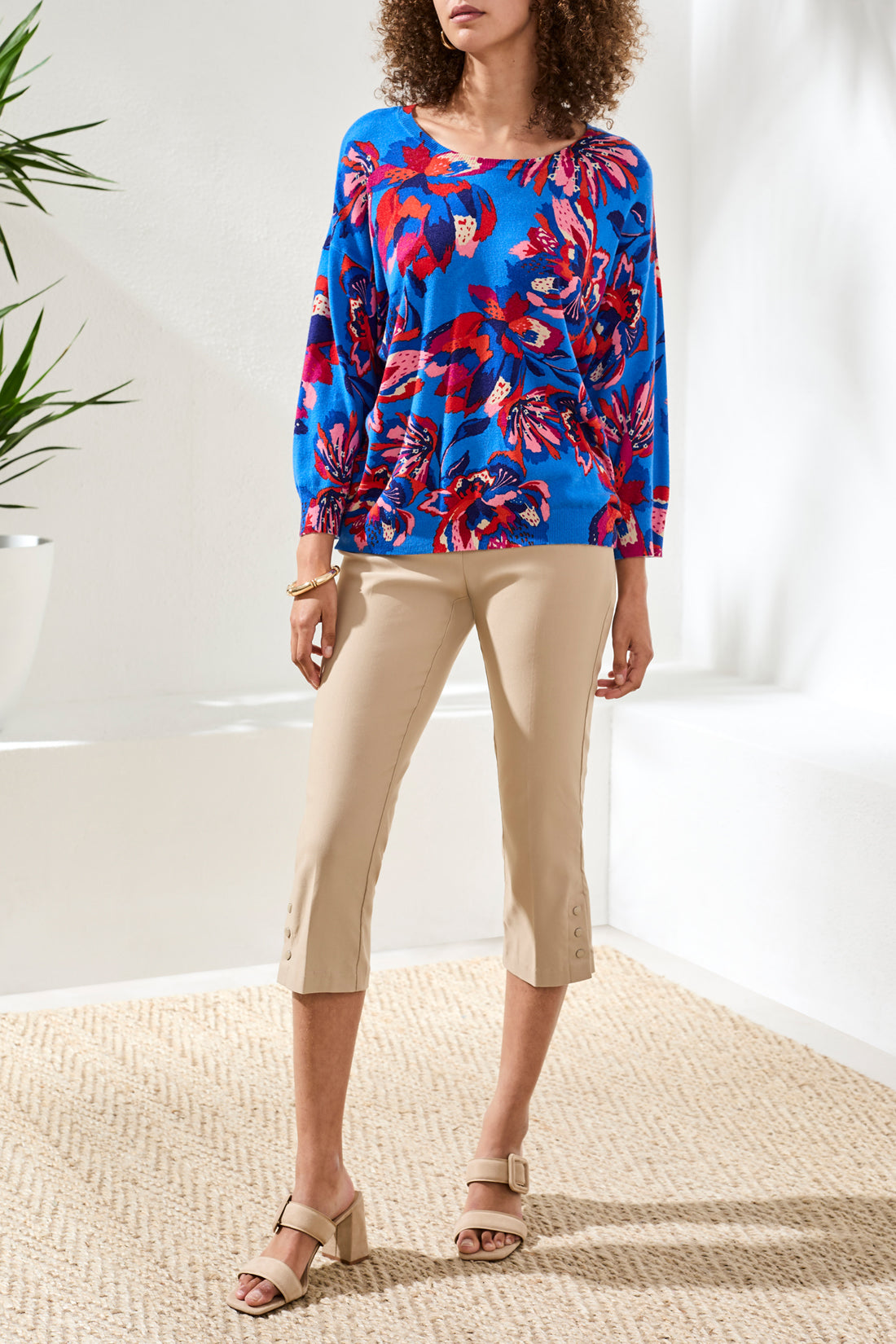 Bright blue Tribal Tropical Treasure Floral Crewneck Sweater by Tribal Sportswear Inc. styled with beige cropped pants