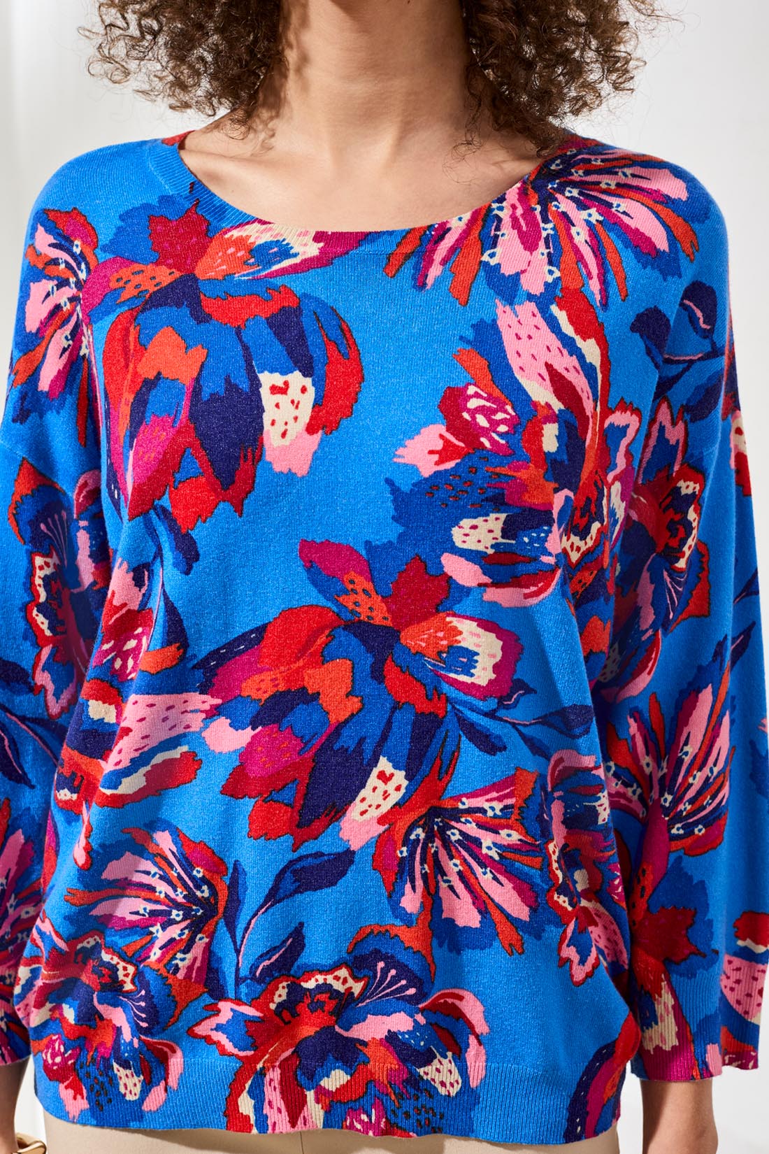 Bright blue floral sweater in red and pink shades, Tribal Tropical Treasure Floral Crewneck Sweater by Tribal Sportswear Inc.