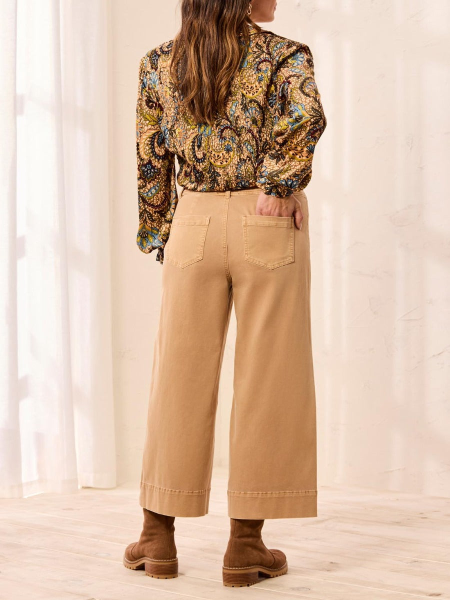 Tribal Comfort Fit 26" Palazzo Denim Pants in cognac color styled with patterned top by Tribal Sportswear Inc.