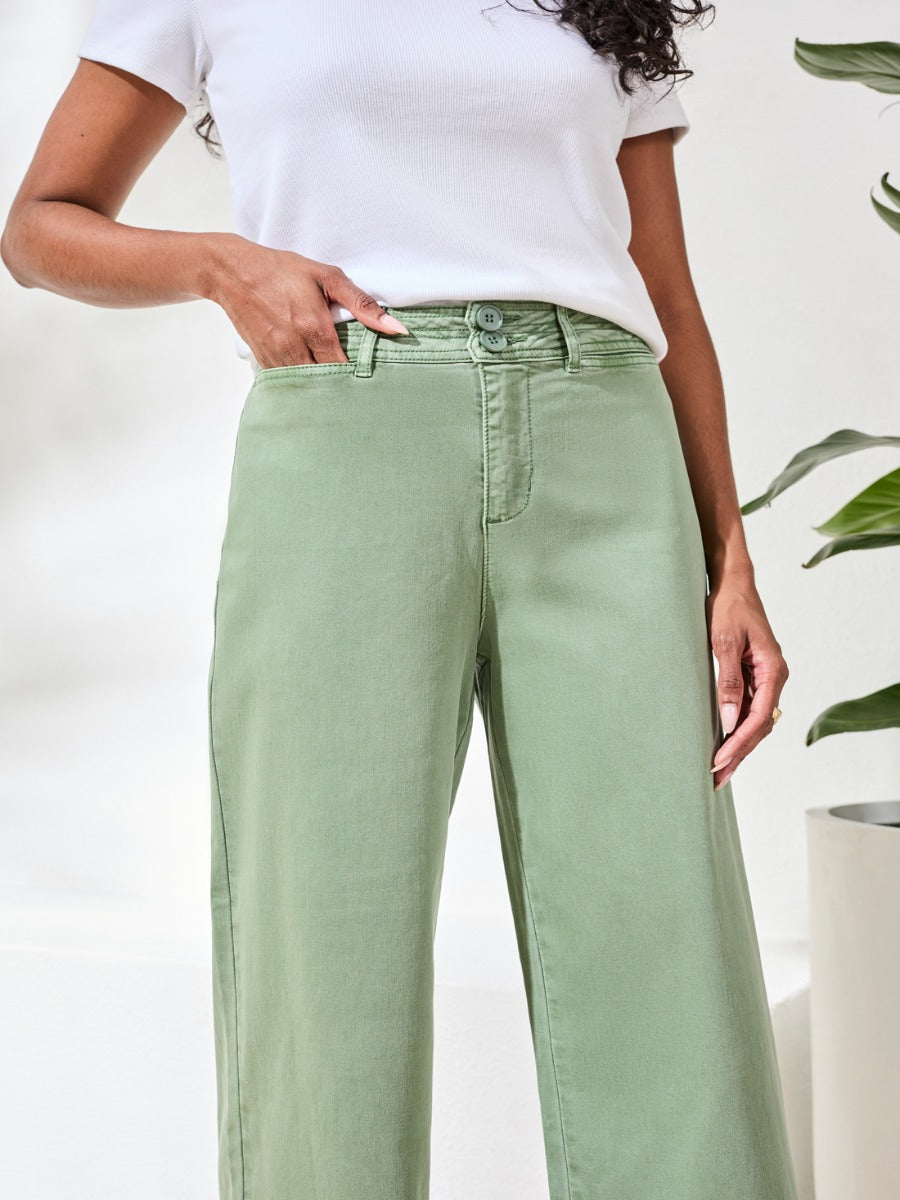 Tribal Comfort Fit 26" Palazzo Denim Pants in moss green, styled with a white top by Tribal Sportswear Inc.