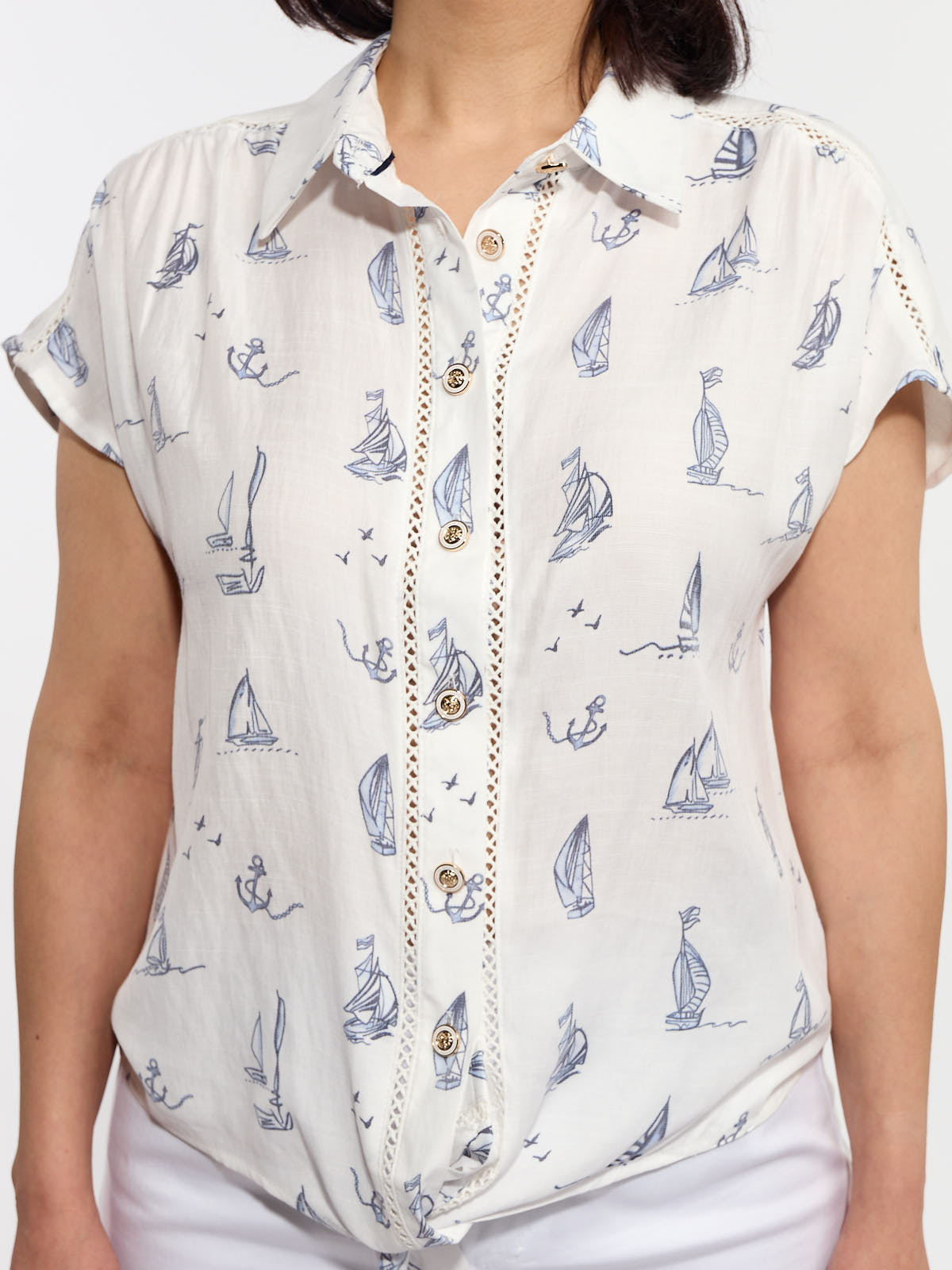 Lois Cora Sailing Button Front Tie Short Sleeve Top in white with blue sailboat and anchor print, casual summer style.