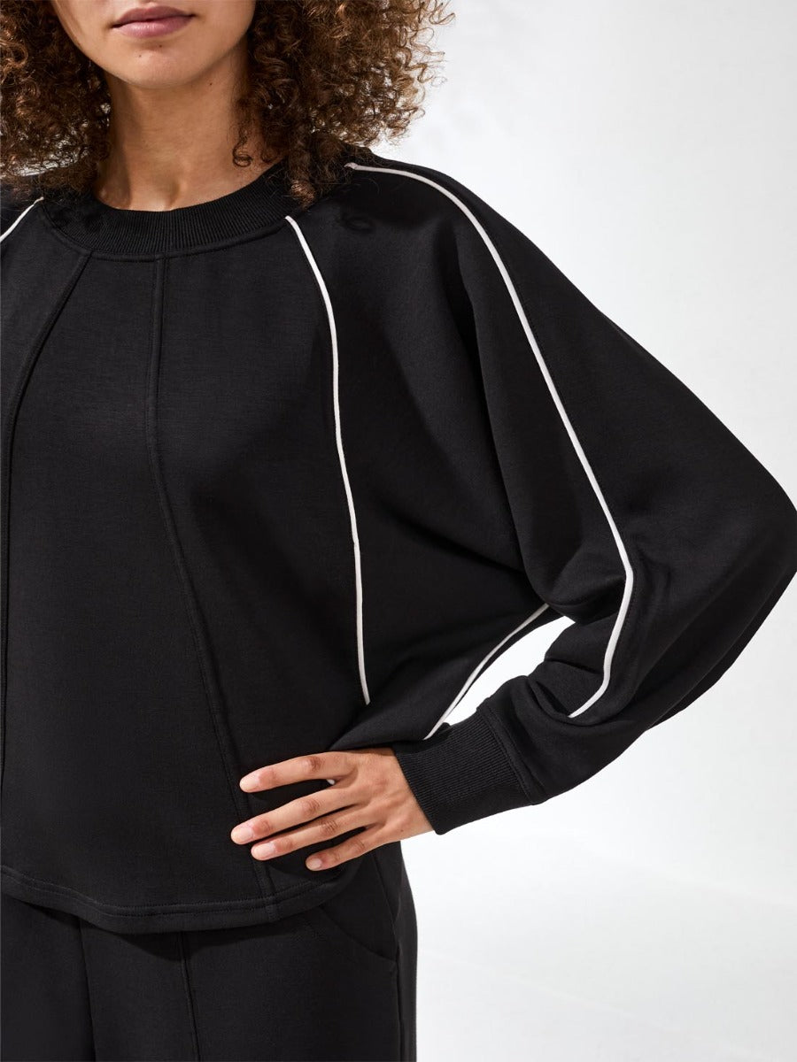 Black Tribal Techno Lux Piping Scuba Crew Top with white piping details by Tribal Sportswear Inc., stylish sweatshirt top.