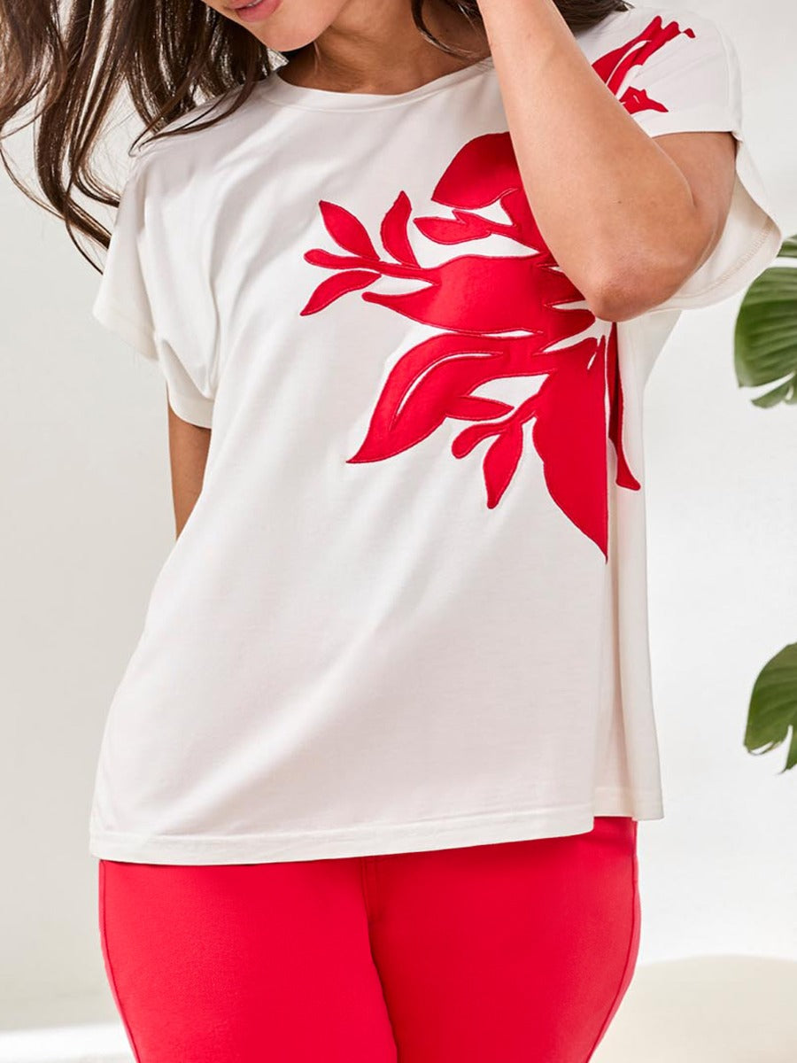 Tribal Playful Applique Short-Sleeve Top by Tribal Sportswear Inc. in white with bold red floral applique design