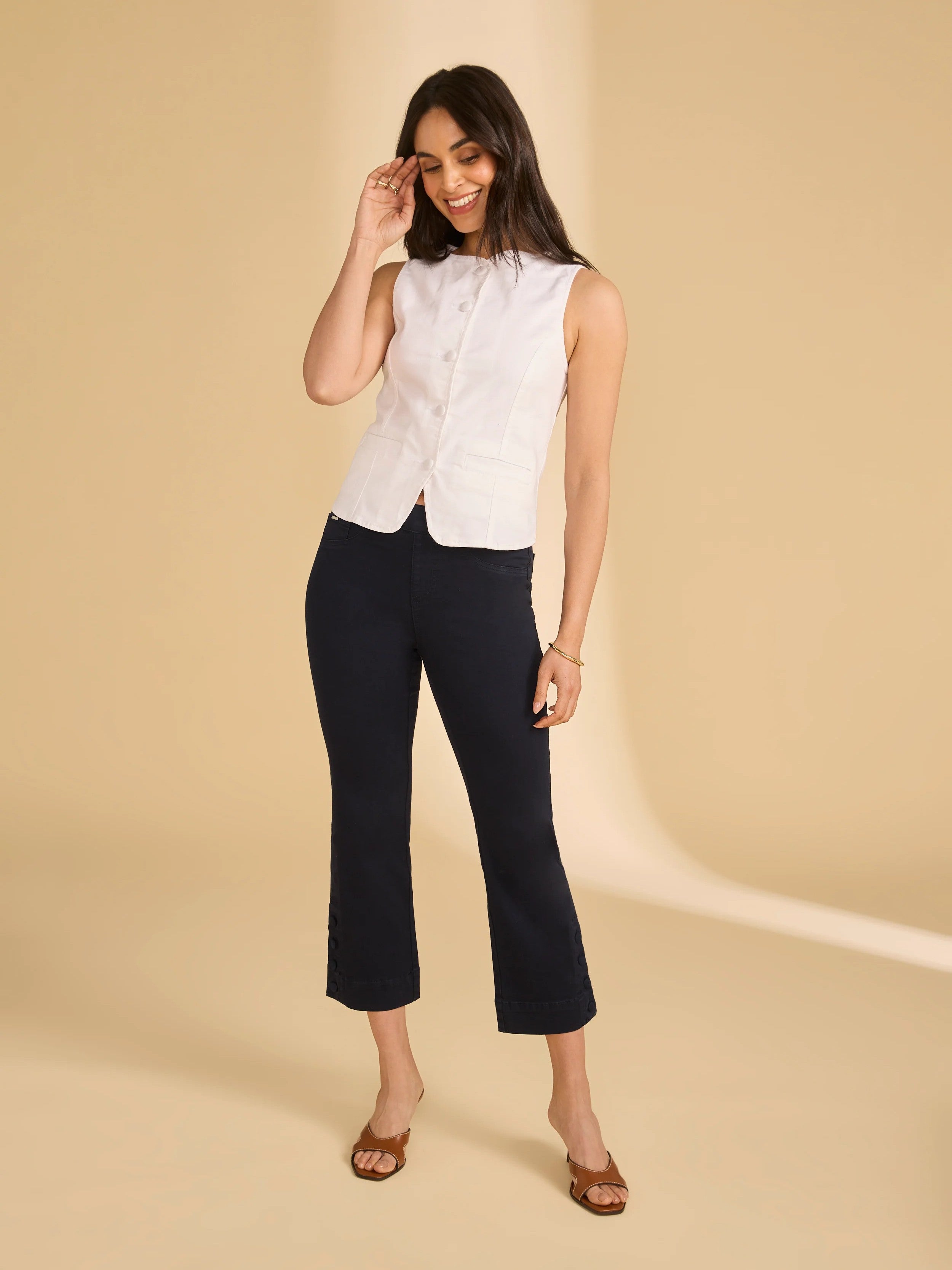 FDJ Olivia Pull-On 26" Inseam Button Hem Crop Pant by French Dressing in navy, styled with a sleeveless white top.
