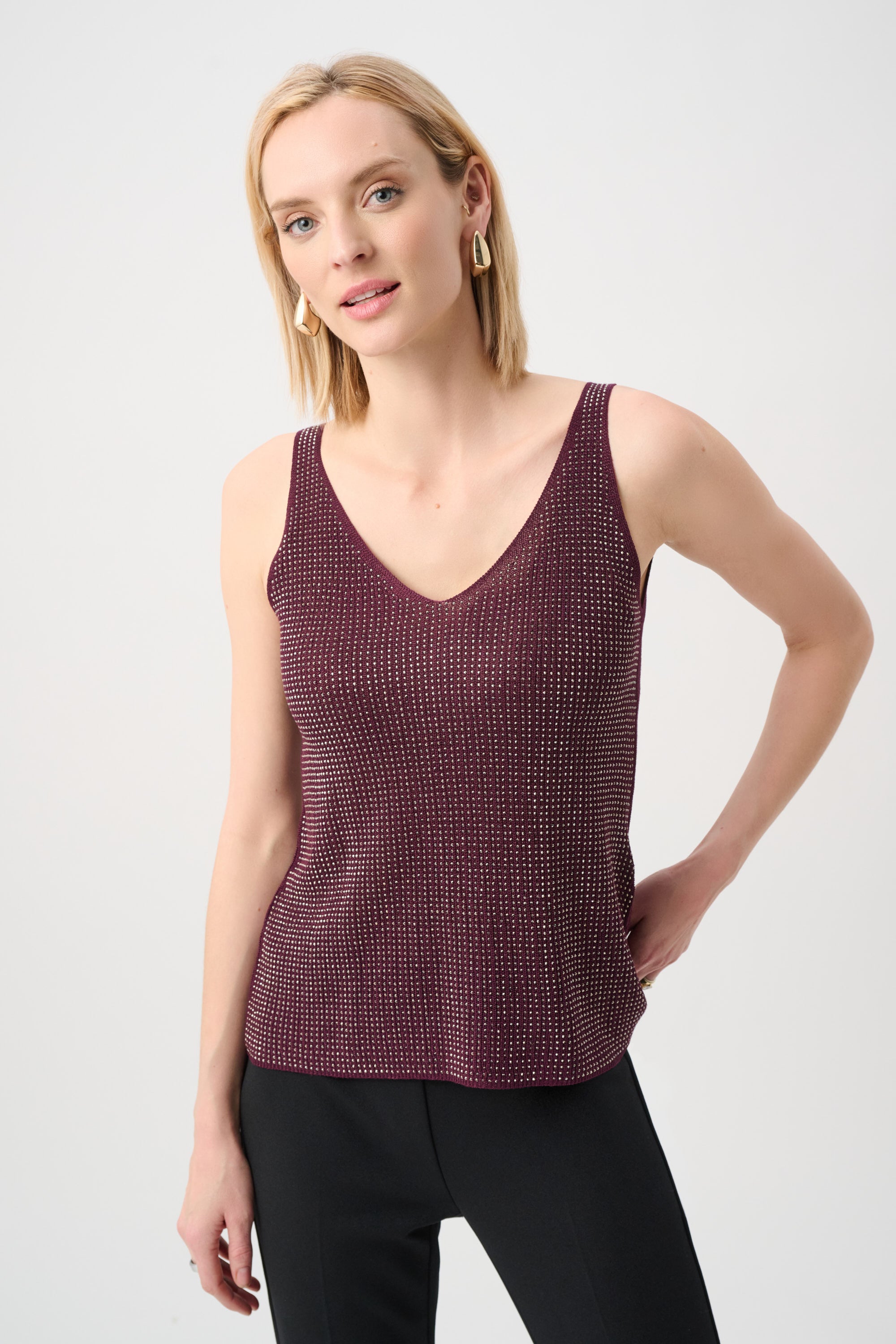Joseph Ribkoff Dazzle Metallic Knit Top in berry color with shimmering texture and sleeveless design paired with black pants