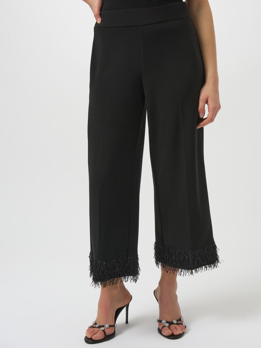 Black Joseph Ribkoff High-Waisted Fringe Trousers with wide legs and fringe hem detail by Joseph Ribkoff
