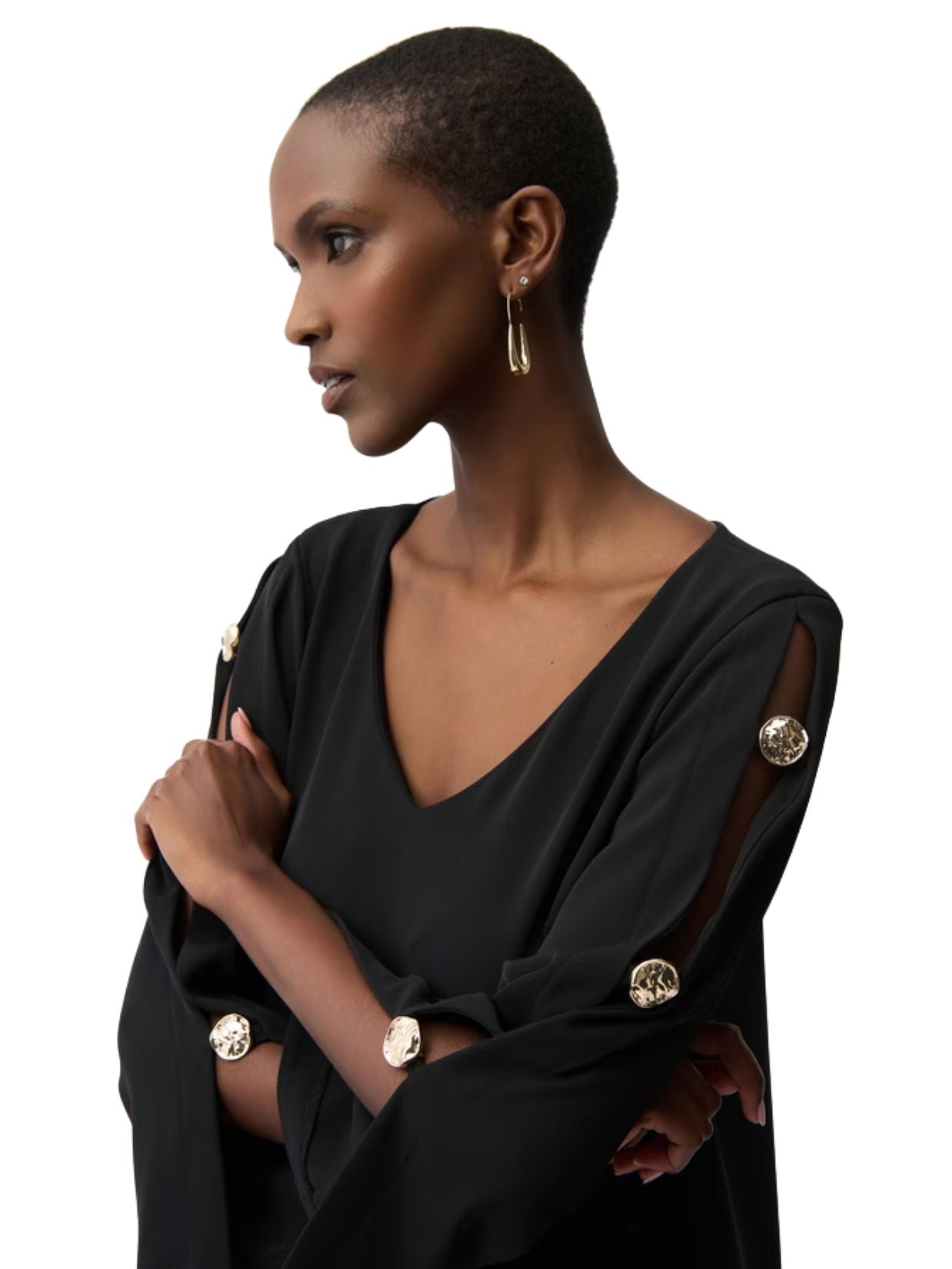 Close-up of Joseph Ribkoff Gold Open Button Sleeve V-Neck Dress featuring gold button sleeve details and V-neck design