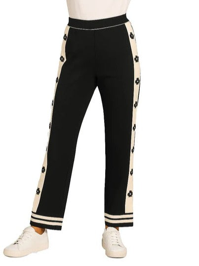 Orly Daisy Tuxedo Pull-On Pants in black with cream floral side stripes and sporty hem detail by Orly