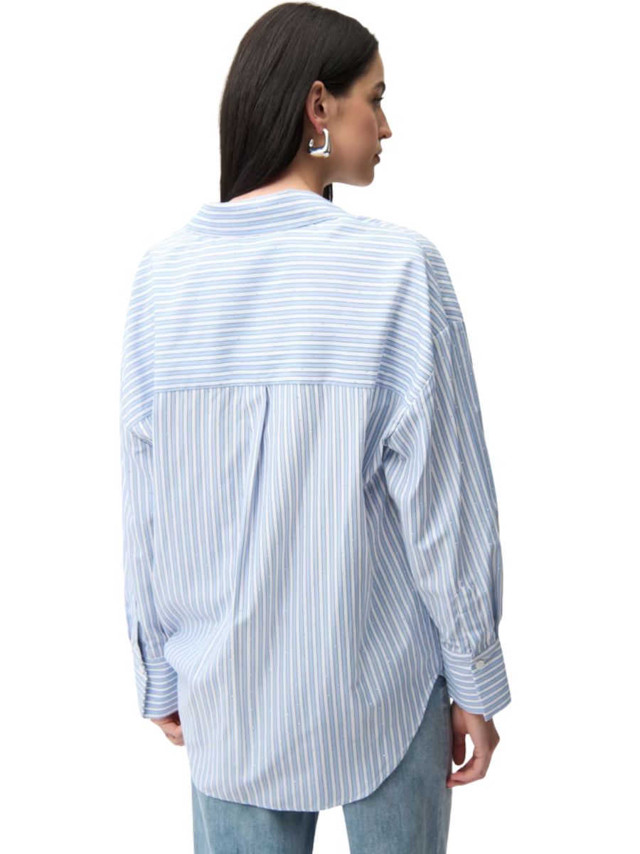 Back view of Joseph Ribkoff Sparkle and Stripe Long Sleeve Shirt in light blue striped pattern, styled with jeans.