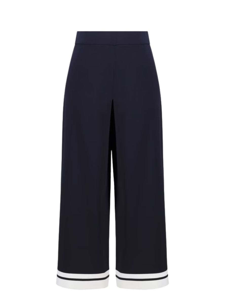 Navy wide-leg cropped pants with front slit and white striped cuffs on a white background