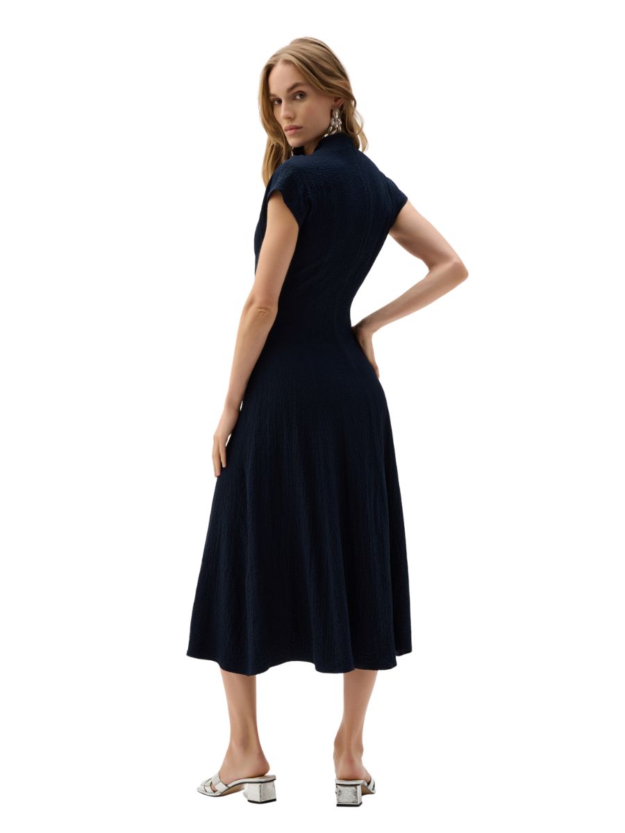 Joseph Ribkoff Sash Tie Midi Dress in dark navy, featuring cap sleeves and a mid-length flowing skirt by Joseph Ribkoff.