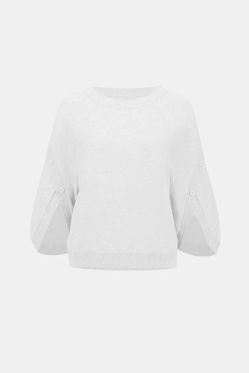 White Joseph Ribkoff Tulip Sleeve Button Crew Sweater with ribbed crew neck and button details on sleeves.