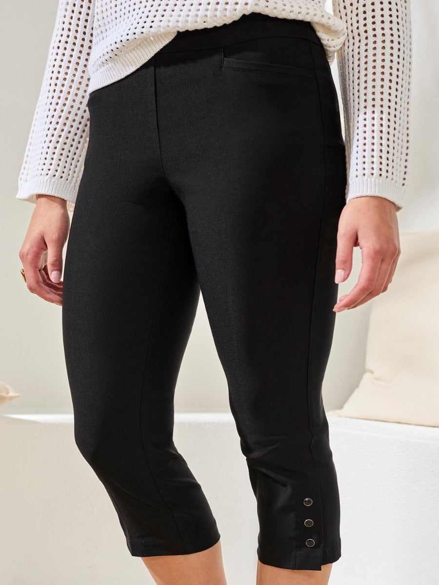 Tribal Flatten It Snap 22" Capri Pants in black by Tribal Sportswear Inc., featuring snap details at hem.