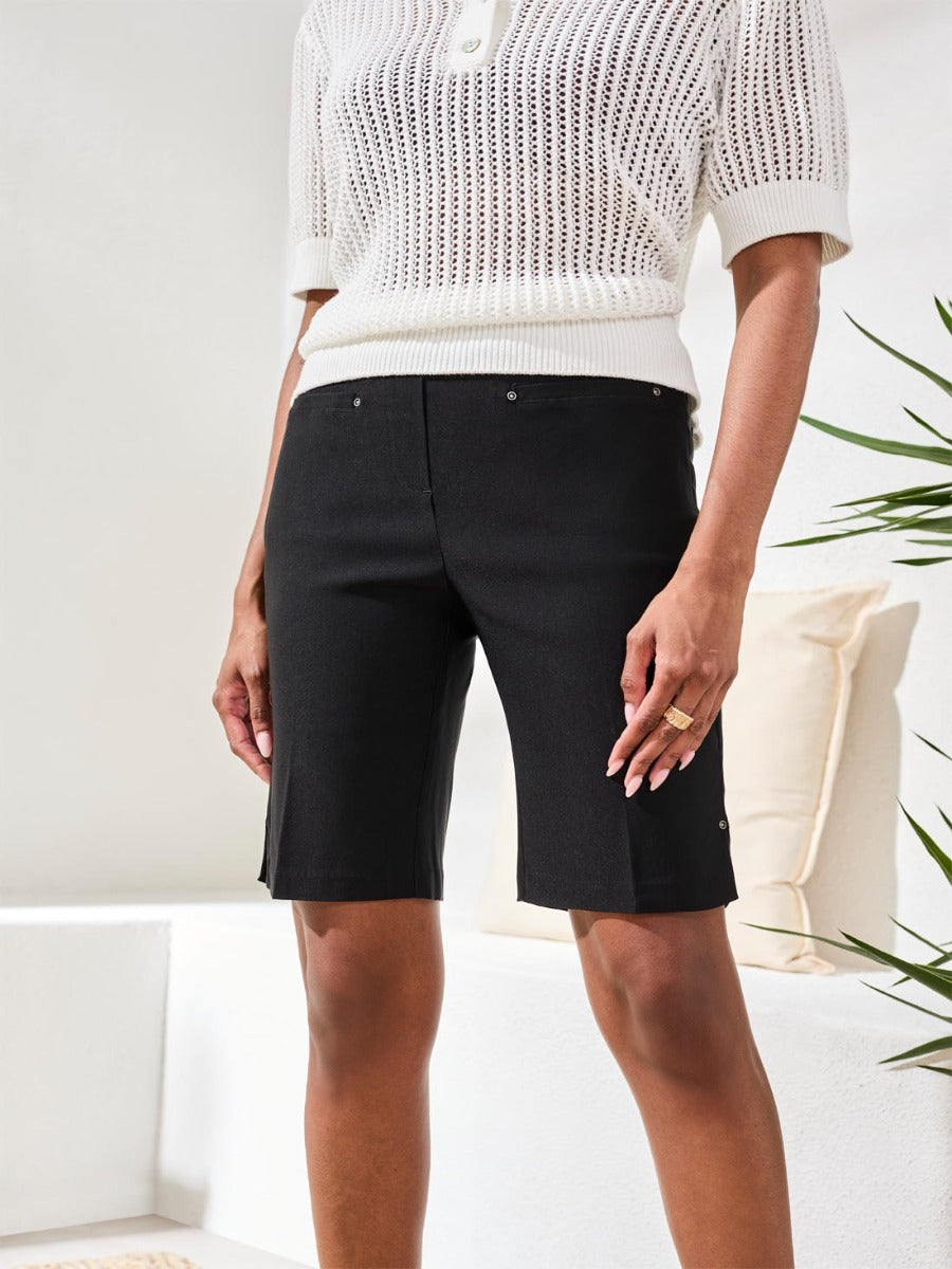 Tribal Flatten It 10" Stretch Shorts in black by Tribal Sportswear Inc., tailored fit with subtle side slits.