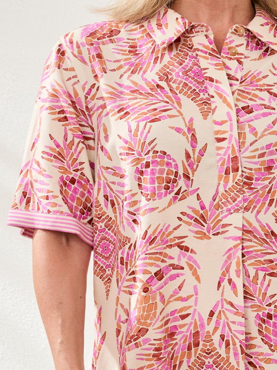 Close-up of Tribal Boho Bloom Linen Button-Front Dress in pink with tropical print by Tribal Sportswear Inc.