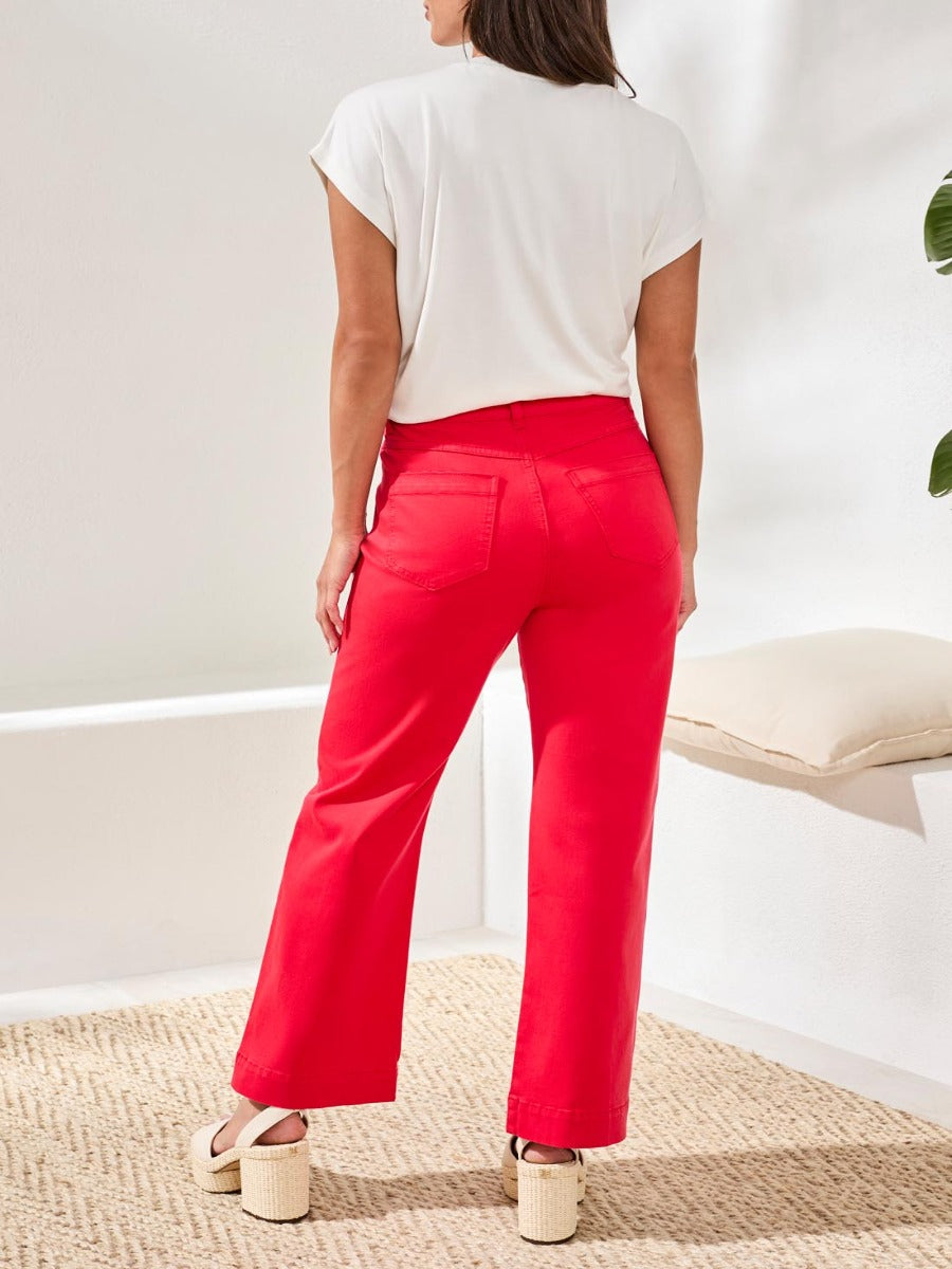 Back view of red Tribal Playful Embroidered Pocket Zip 28? Pants by Tribal Sportswear Inc. styled with white top