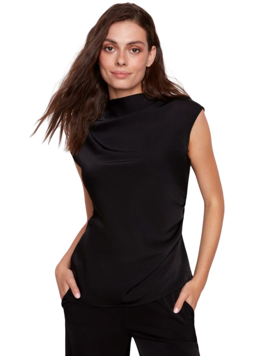 UP Brooke Belize Ruched Top in black by Up, sleeveless with high neck and ruched side detail, paired with black pants.