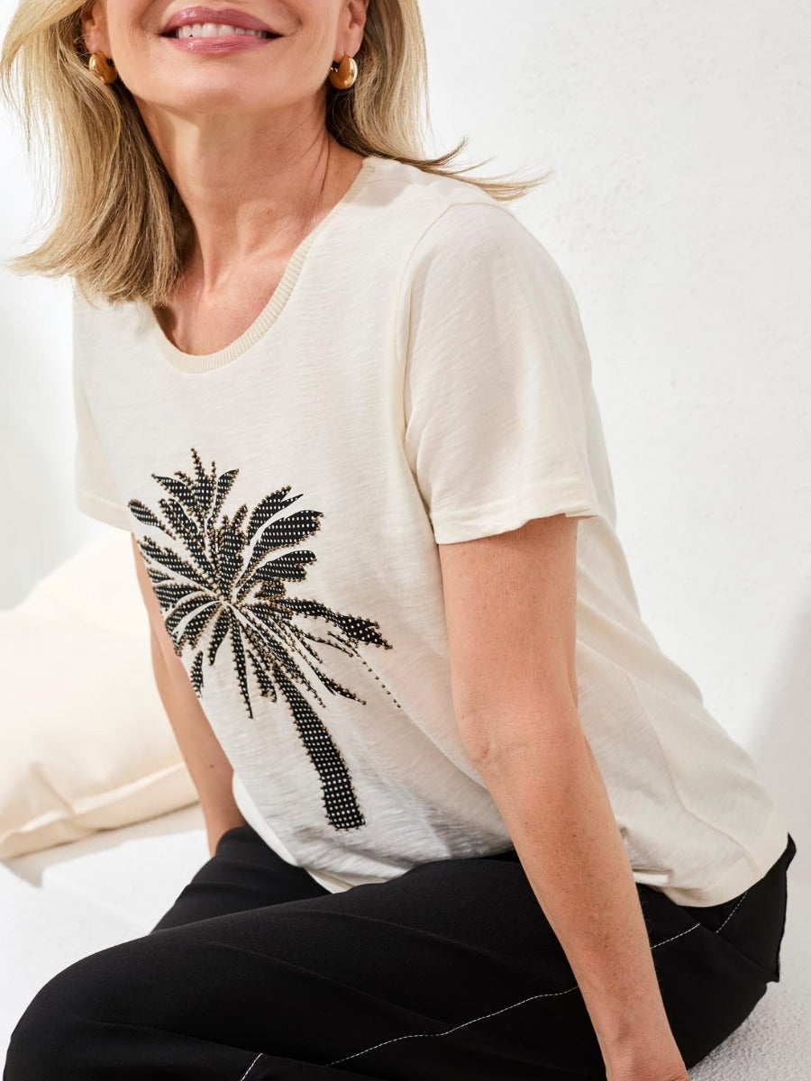 Tribal Fleur Desert Embroidered Palm Tee by Tribal Sportswear Inc. in beige with detailed palm embroidery on lightweight fabric