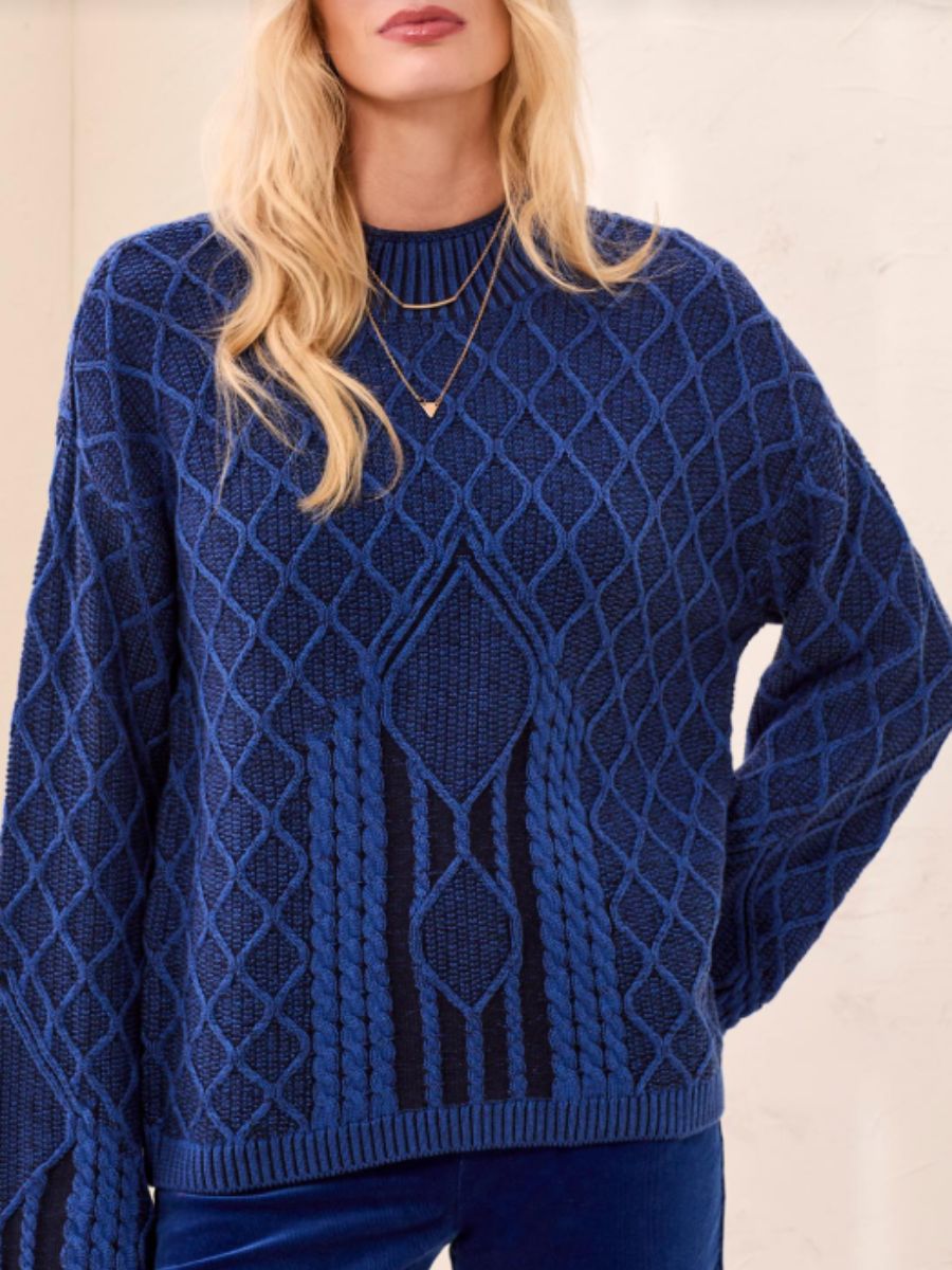 Close-up of a blue Tribal Cotton Cable Mock Neck Sweater showcasing knit patterns by Tribal Sportswear Inc.