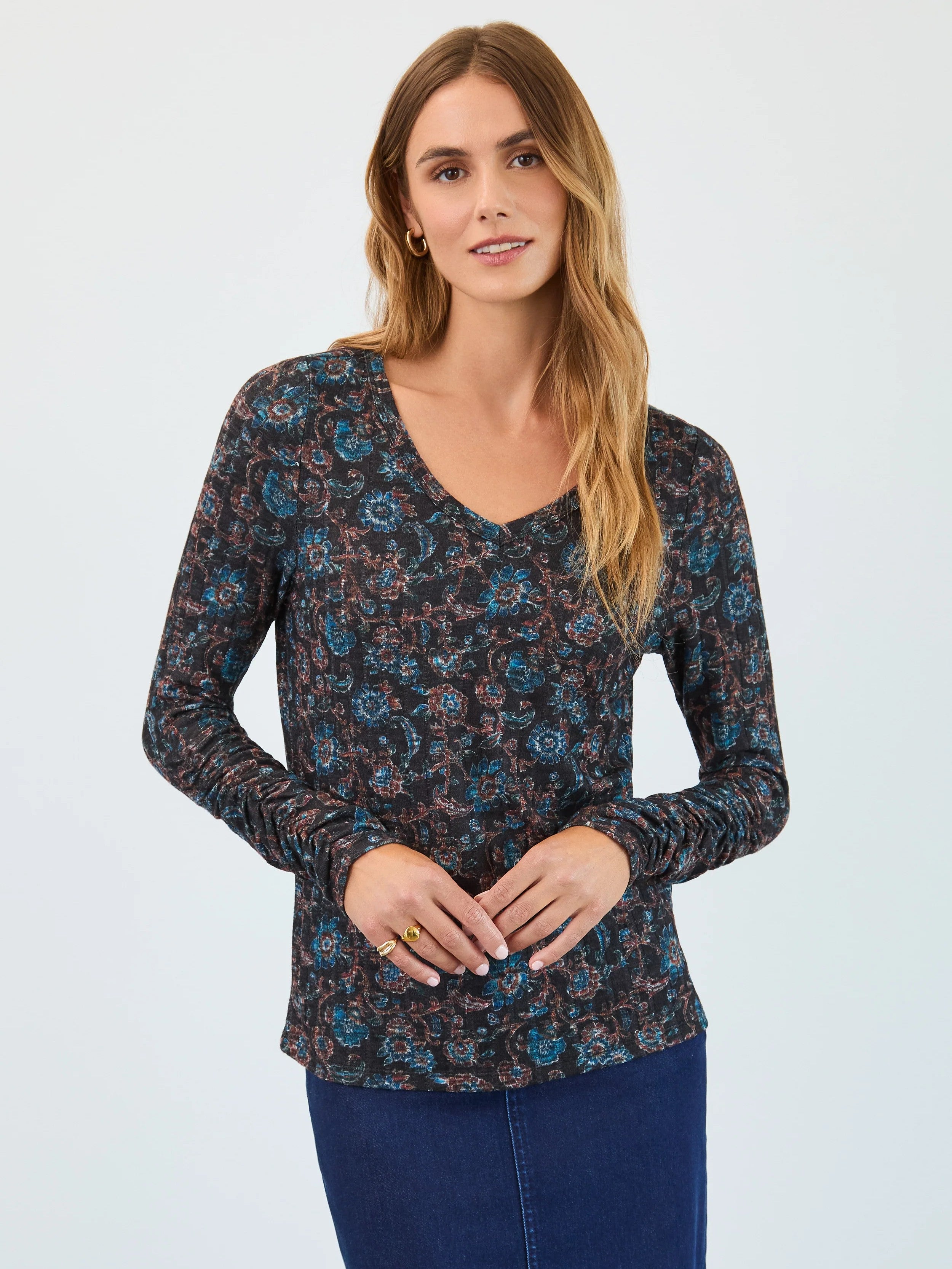 FDJ Floral V-Neck Long Sleeve Top by French Dressing in dark floral print with blue and brown tones, paired with a denim skirt.