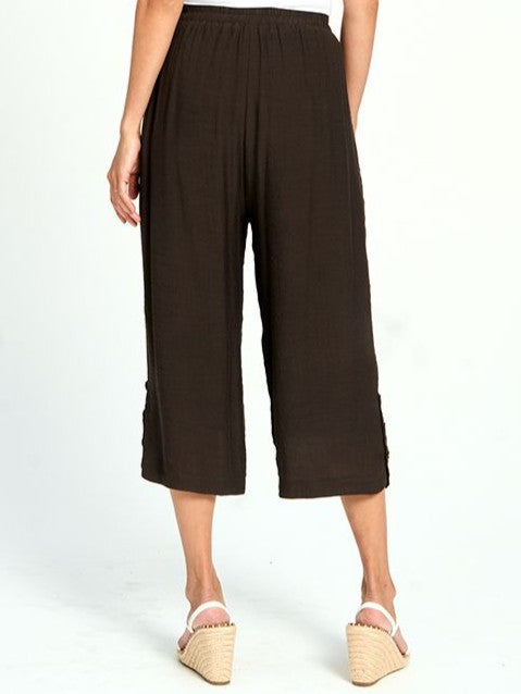 Back view of Red Coral Button Hem Linen Look Pull-On Pant in espresso brown with side button details.