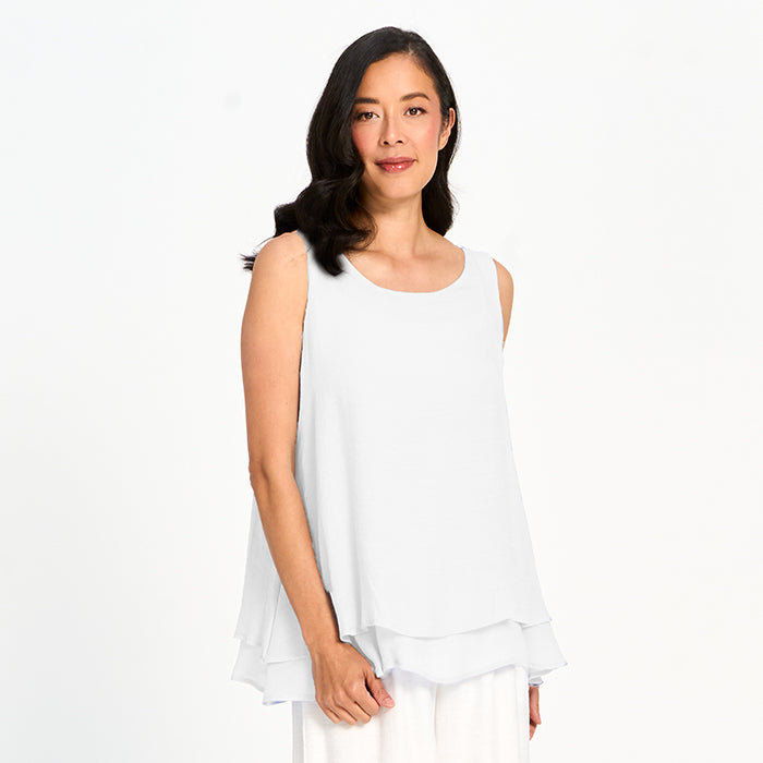 Elegant white Sharon Layered Sleeveless Blouse by Red Coral, featuring a double-layered design and sleeveless cut.
