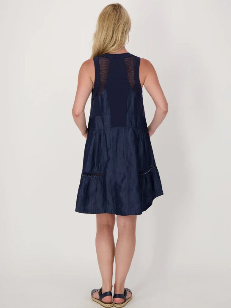 Spanner Gabby Tiered Mesh Insert Sleeveless Dress in dark denim with sheer mesh panels and tiered skirt detail.
