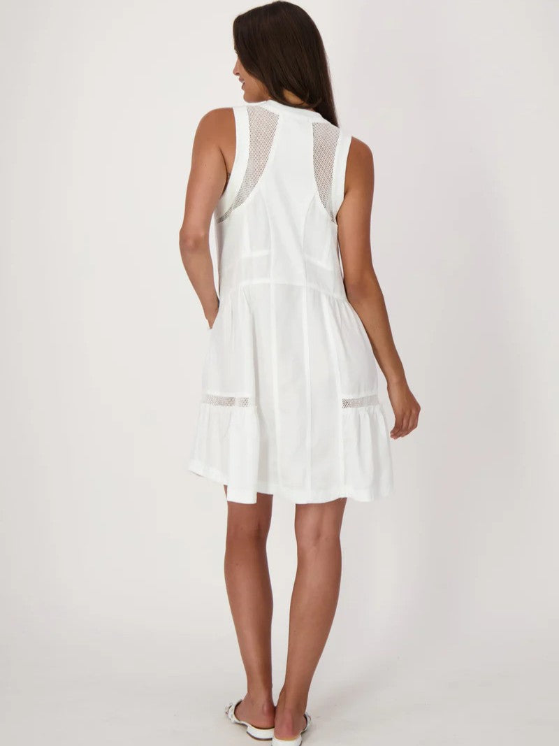 Back view of a sleeveless white dress with mesh panel details and a loose, flowy skirt.