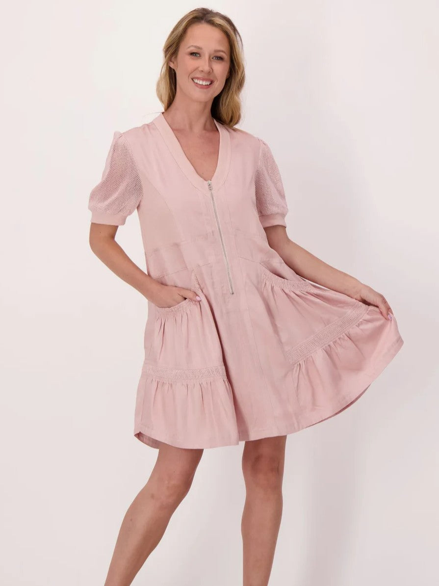 Spanner Gabby Tiered Mesh Insert Short Sleeve Dress in soft rose pink with front zip and textured mesh sleeves.