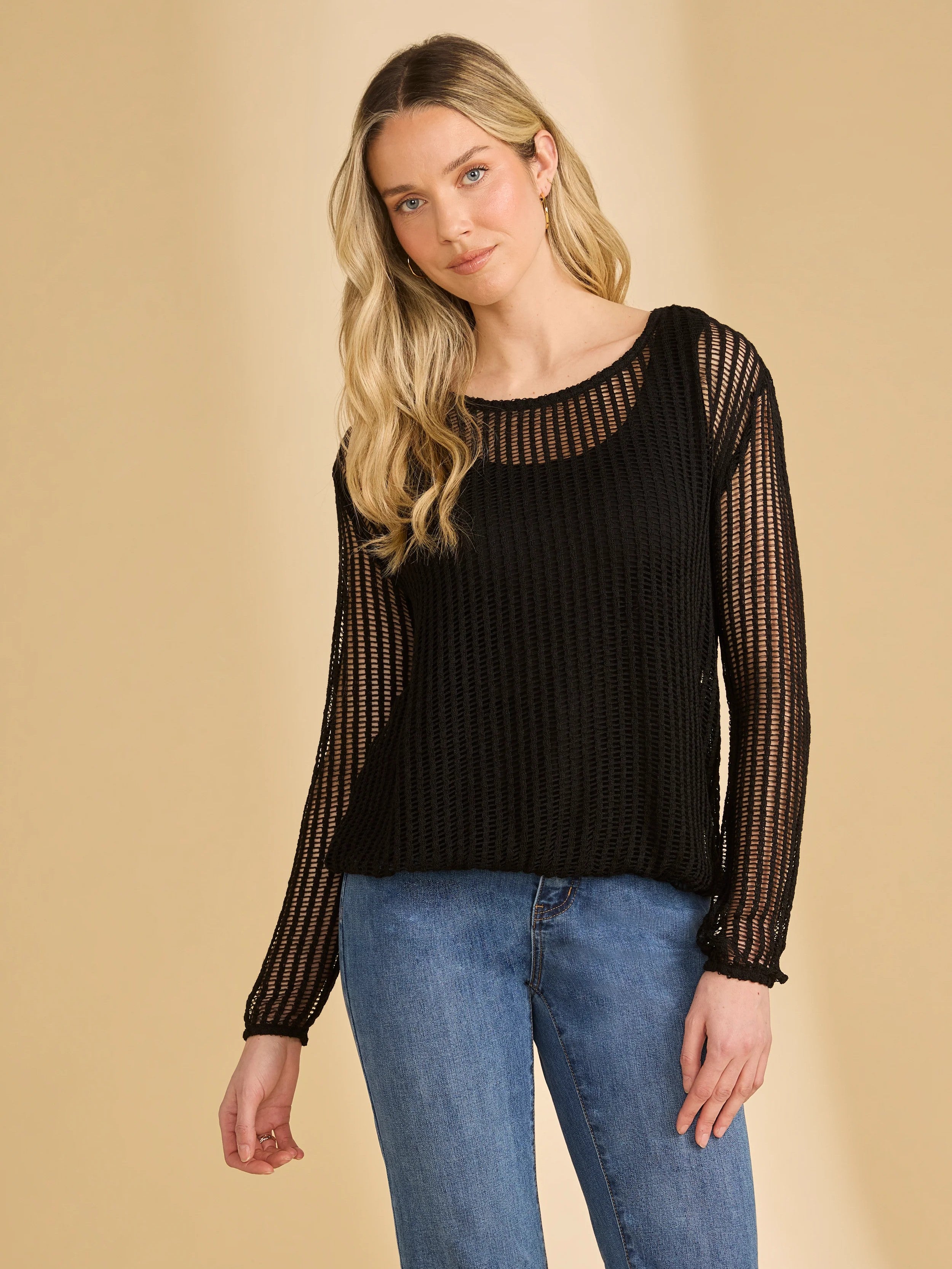 Black French Dressing Mesh Knit Bubble Top by French Dressing, featuring long sleeves and a textured knit design.