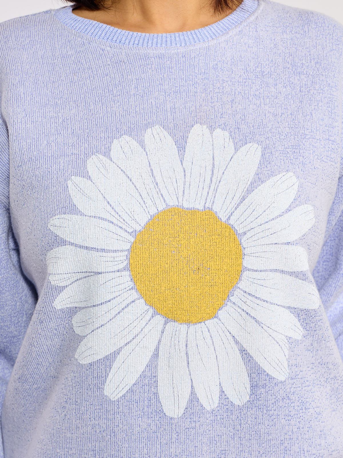 Women’s Daisy Graphic Nantucket Crewneck Sweatshirt by Win.E in soft blue with large white and yellow daisy design.