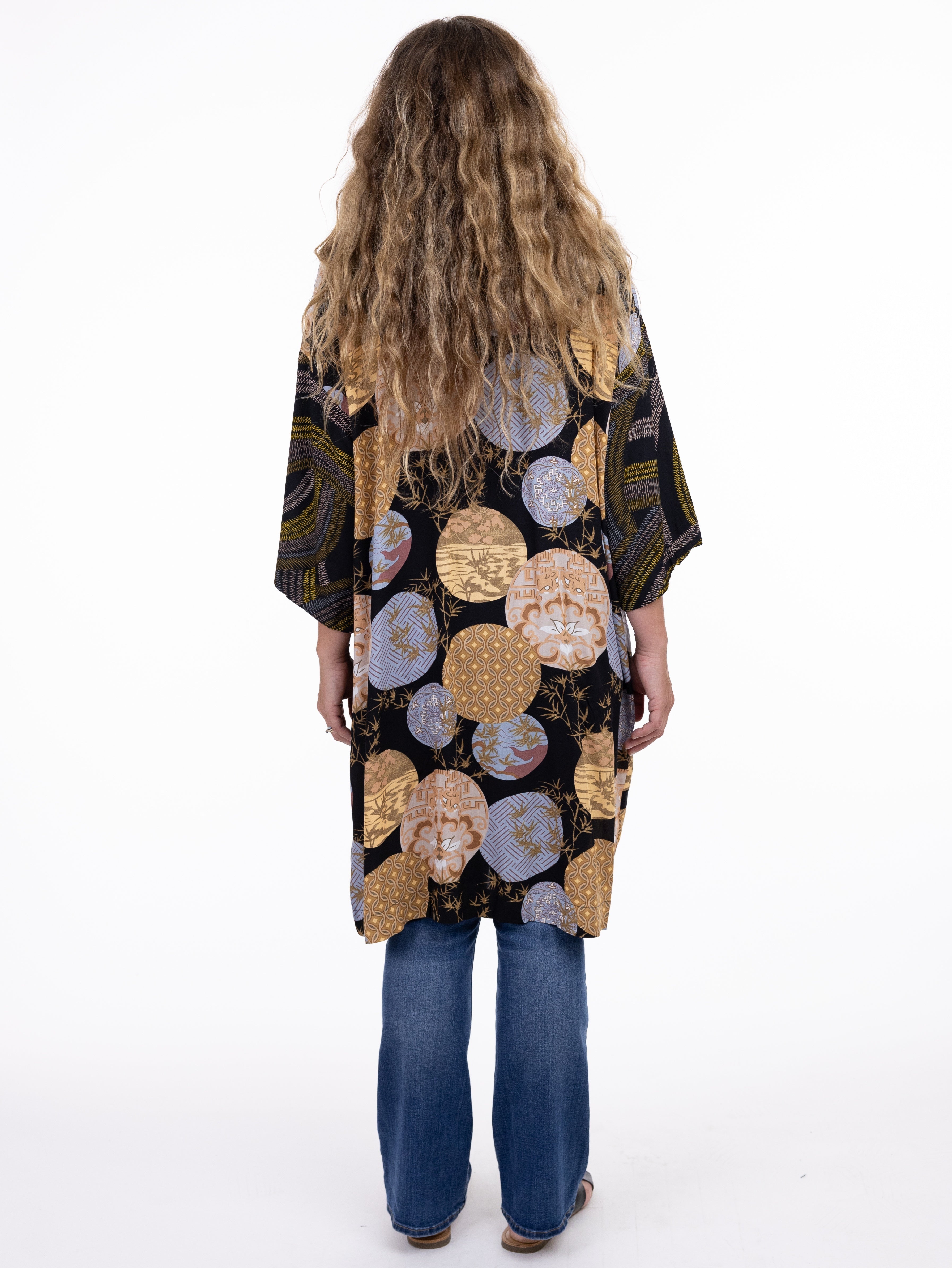 Shannon Passero Janis Denim Trim Cardigan with patterned design worn over denim jeans by SHANNON PASSERO INC