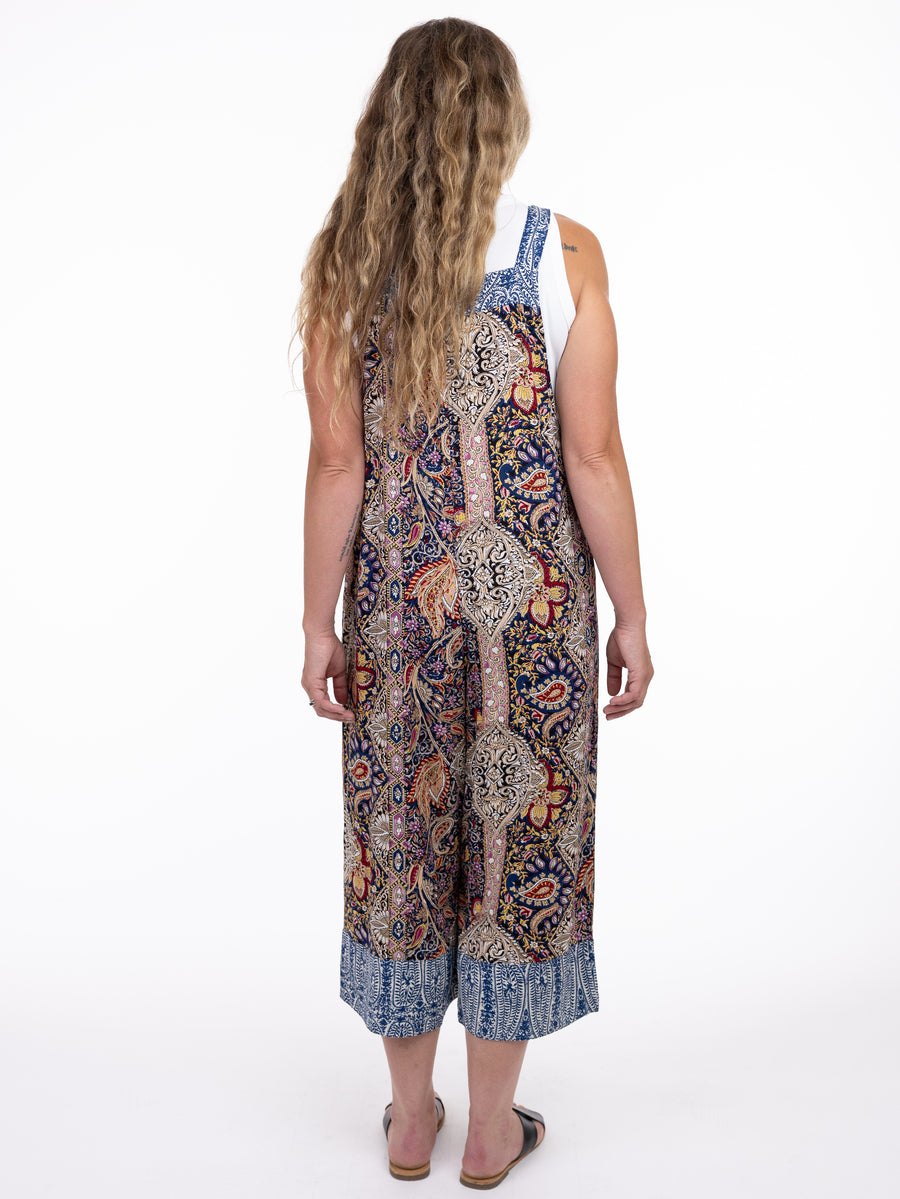 Shannon Passero Elora Print Overall in blue patterned fabric by SHANNON PASSERO INC, styled with a white top and sandals