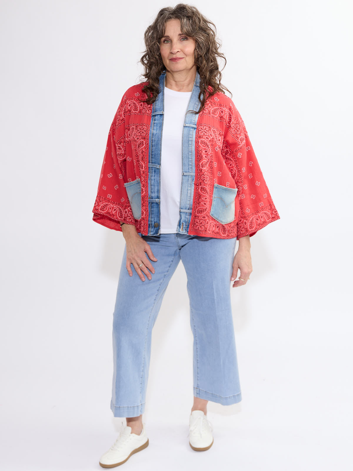 Shannon Passero Bandana Short Kimono in red with denim trim and pockets by SHANNON PASSERO INC, styled with light denim jeans.
