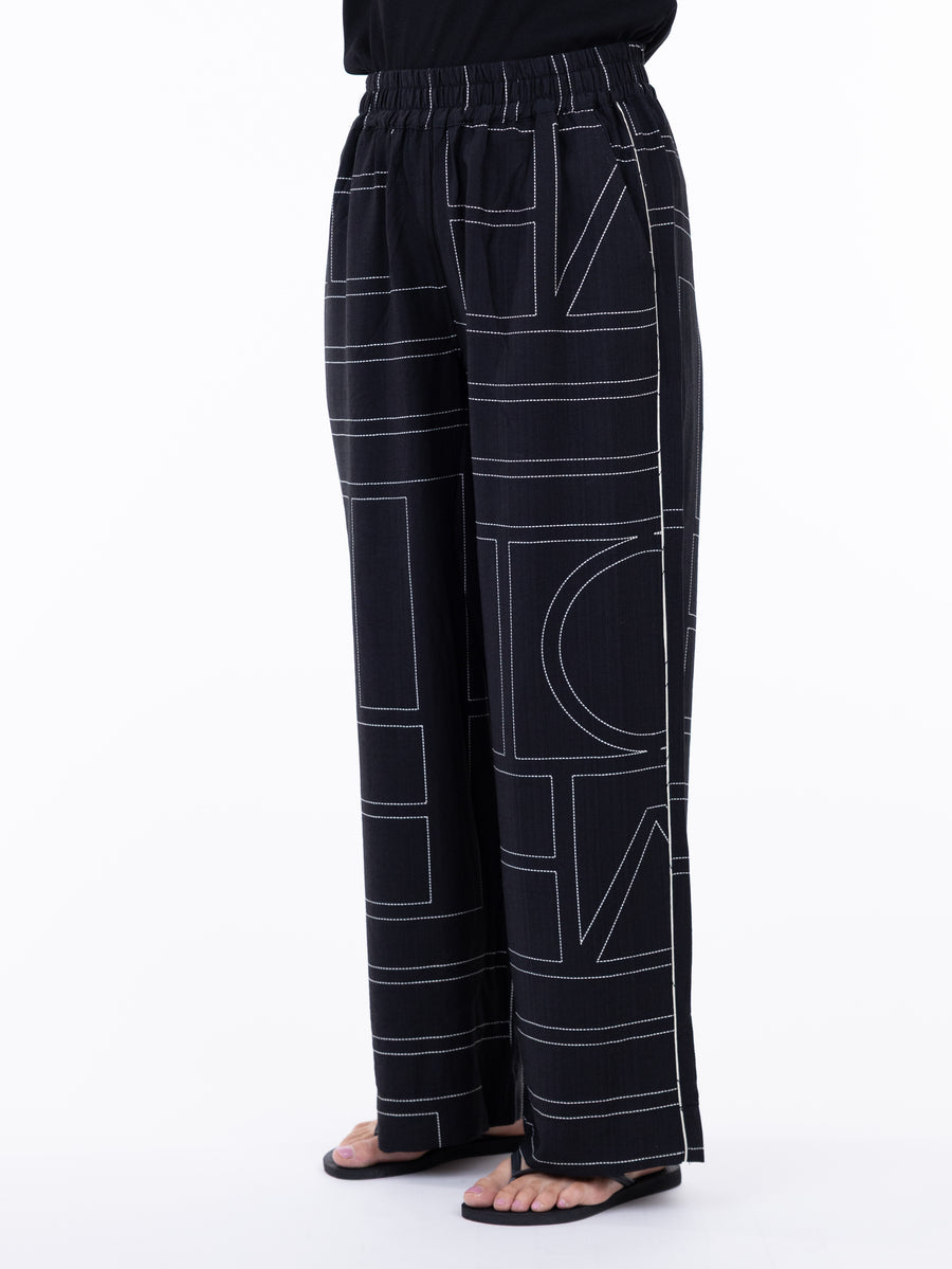 Black wide-leg pants with white geometric lines from SHANNON PASSERO INC, Shannon Passero Lani Art Deco Pant.