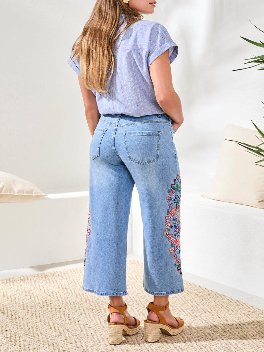 Tribal Ray of Colour Audrey Embroidered 25" Denim by Tribal Sportswear Inc., light blue with floral embroidery and wide leg cut
