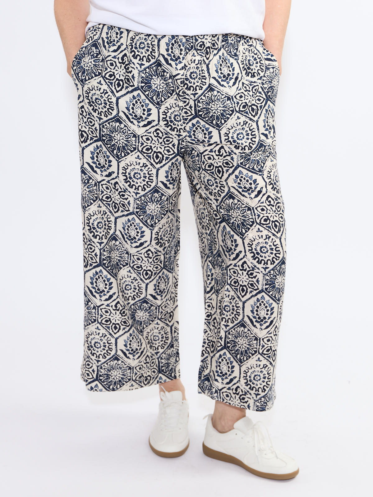 Shannon Passero Ellie Palms PO Crop Pant in navy patterned fabric by SHANNON PASSERO INC paired with white sneakers
