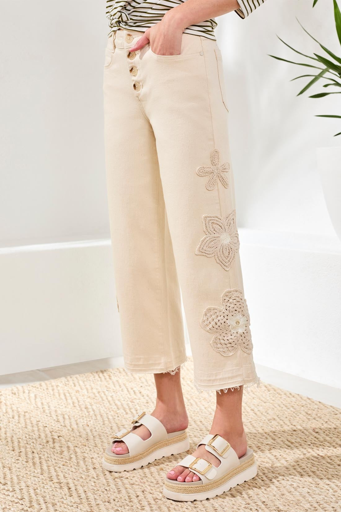 Tribal Lush Audrey Cropped 26" Wide-Leg Pants by Tribal Sportswear Inc. in cream with floral embroidery and button front
