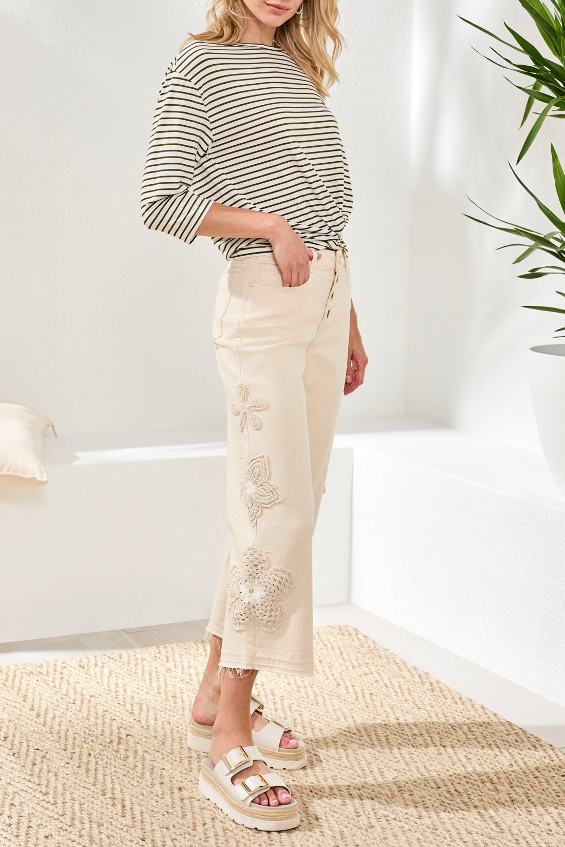 Tribal Lush Audrey Cropped 26" Wide-Leg Pants by Tribal Sportswear Inc. in cream with floral embroidery detail.