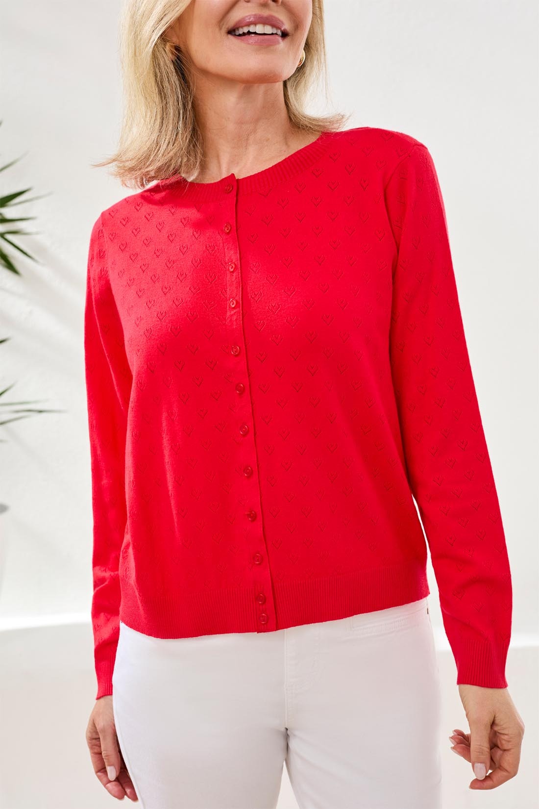 Red button-up sweater with pointelle heart pattern from Tribal Sportswear Inc., Tribal Playful Heart Pointelle Crew Cardigan