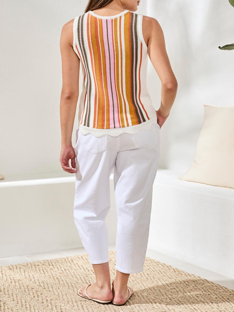 Back view of colorful striped Tribal Lush Oasis Striped Sleeveless Sweater by Tribal Sportswear Inc. styled with white pants